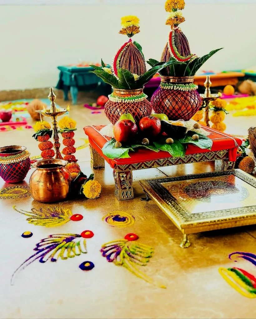 Vastu Shanti Puja being performed at home with Havan fire and Kalash.